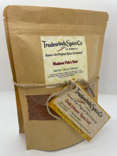 Load image into Gallery viewer, Ono Gift Set 1 includes our top selling spice blends created by Martin Rice. Madame Pele's Heat our most favorite spice, used as a mild Cajun flavor. Leilani's Seasoning Salt was made world famous by Duane Ono Char Burger after 29 years of sprinkling it on their French Fries. Definitely a local favorite. 7 oz. Madame Pele's Heat. 8 oz. Leilani's Seasoning Salt Includes gift wrapping.